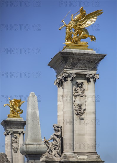 Columns and gilded sculptures on the Pont Alexandre III