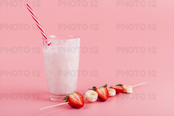 Glass yogurt with fruit skewer