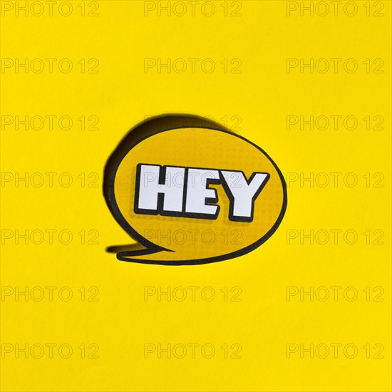 Hey speech bubble yellow backdrop