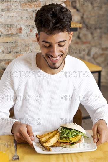 Medium shot man with delicious food