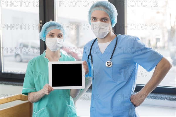 Nurses with chalkboard