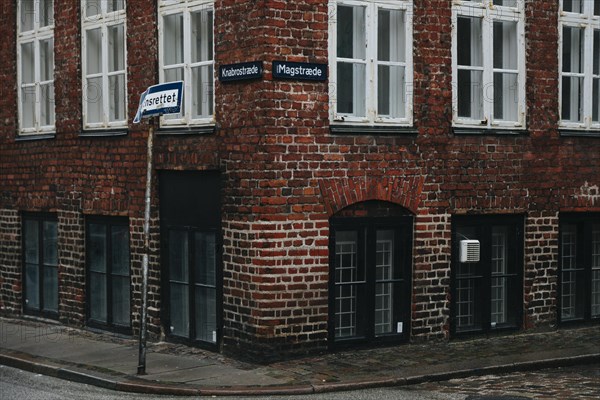 Old building corner paved street