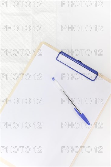 Pen white paper clipboard against white background