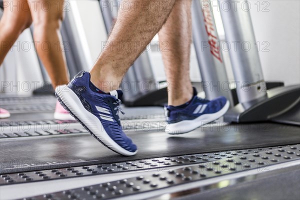 People running treadmill