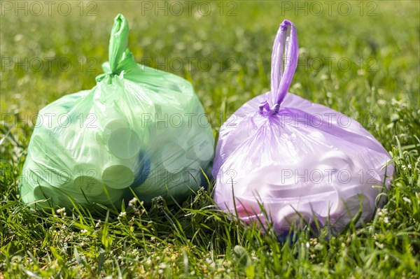 Plastic bags with trash grass