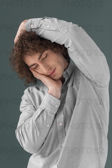 Portrait curly haired young man 7