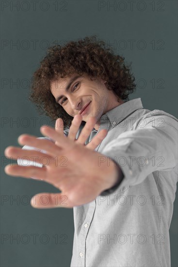 Portrait curly haired young man 11