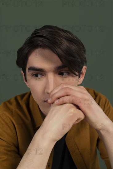 Portrait young man wearing shirt posing 2