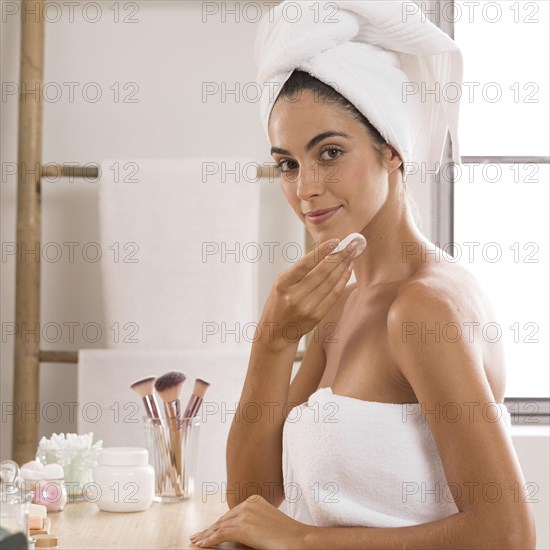 Side view woman wearing towels