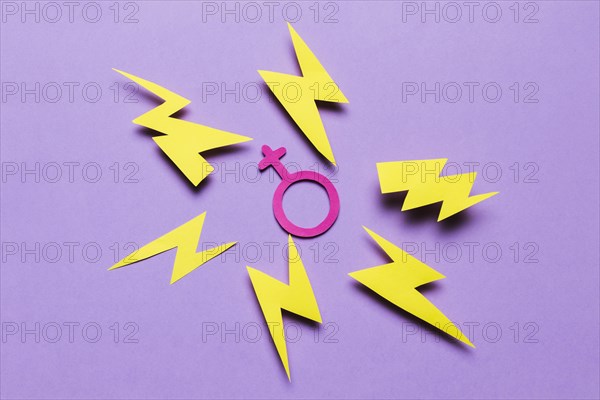 Top view feminine sign surrounded by thunders