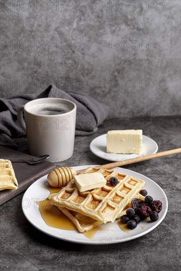 Waffles plate with honey butter