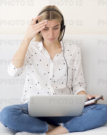 Woman trying homework laptop