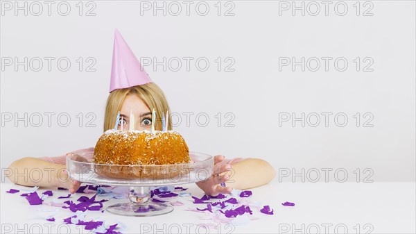 Birthday concept with womans face cake