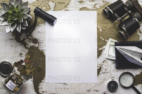 Blank paper with flashlight travel objects
