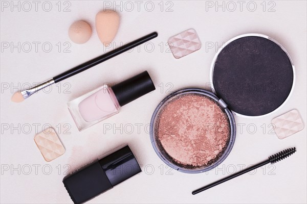 Blender sponge makeup brush eyeshadow compact face powder pink background