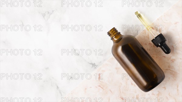 Bottle oils marble background