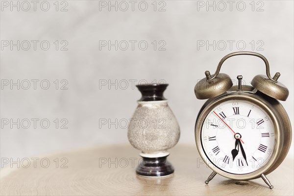 Close up clasic alarm clock nightstand
