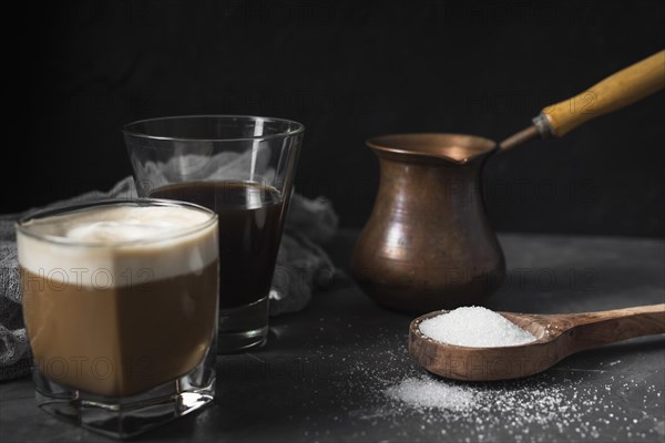 Close up glasses with coffee sugar