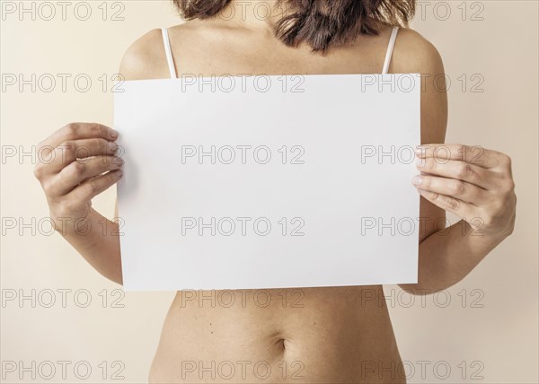 Close up hands holding empty paper