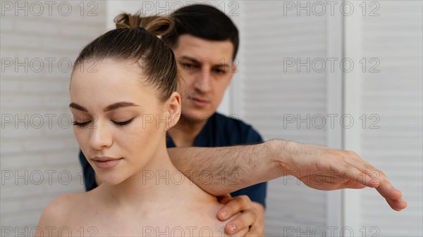 Close up man massaging woman