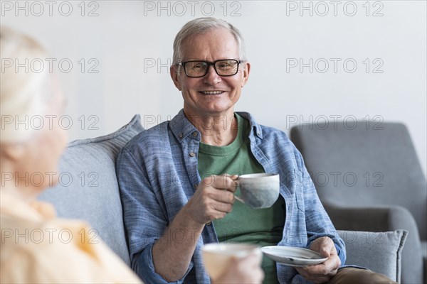 Close up smiley retired couple