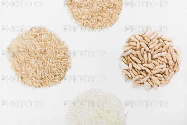 Close up uncooked rice isolated white background