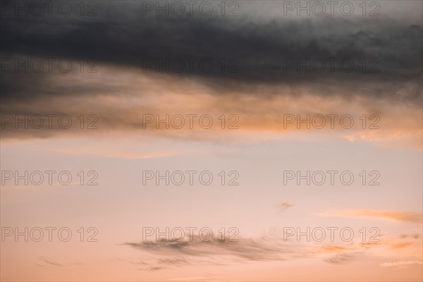 Clouded pink sky with copy space background