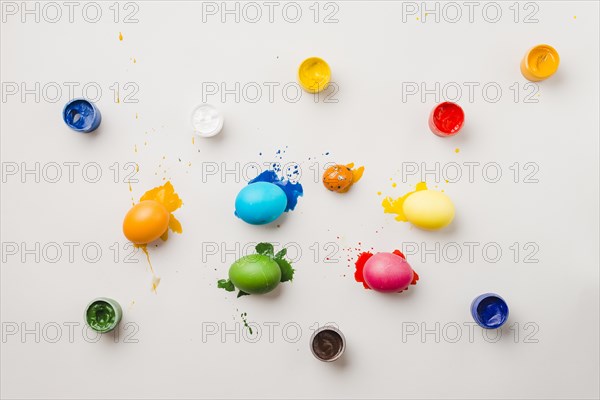 Collection easter eggs near water colors