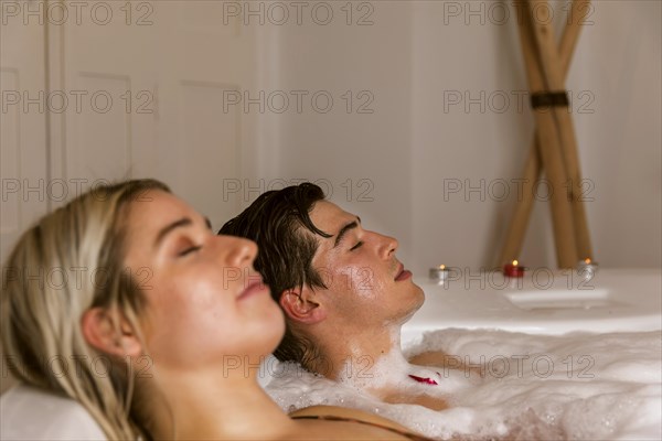 Couple relaxing hot tub