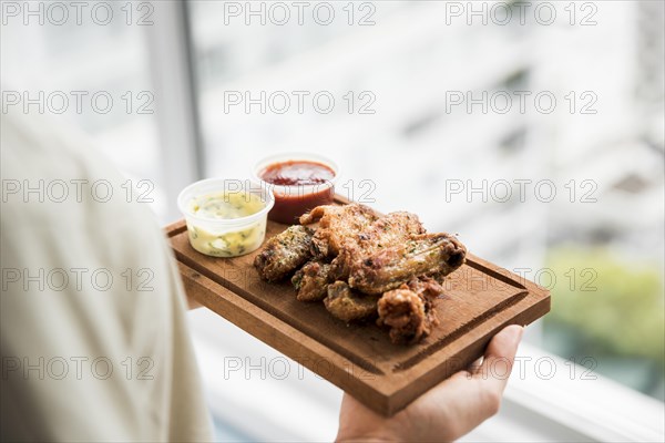 Crispy fried chicken appetizer with sauces