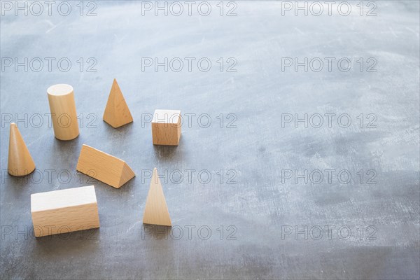 Desktop with wooden geometrical shapes