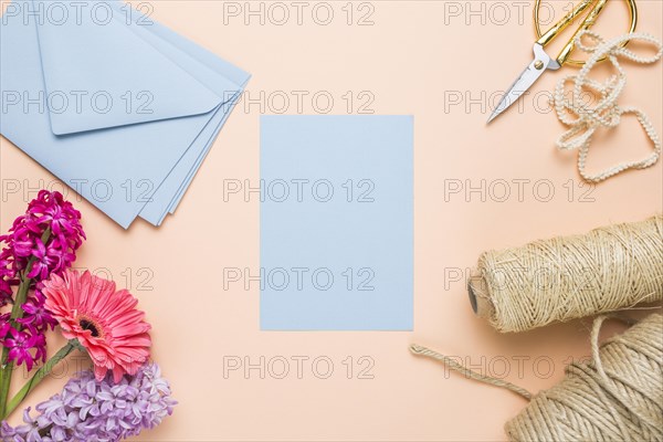 Flat lay blue wedding invitations with envelopes