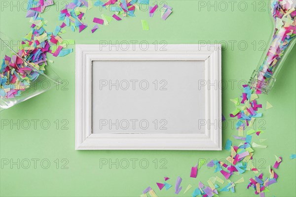 Frame confetti with green background