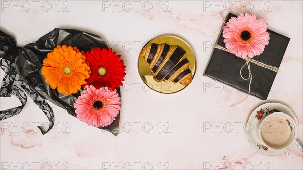 Gerbera flowers packaging film with gift box croissant