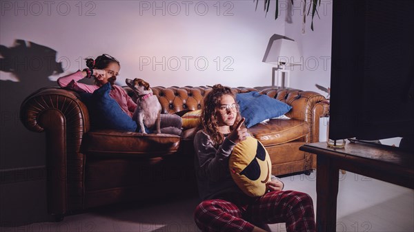 Girls watching tv evening