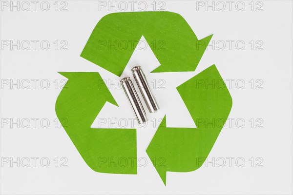 Green eco recycle symbol used batteries