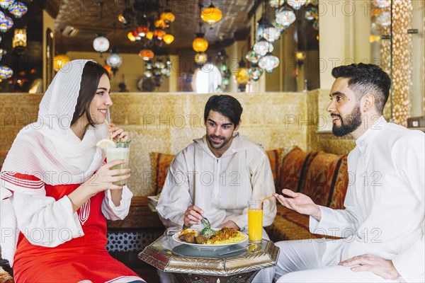 Group muslim friends restaurant