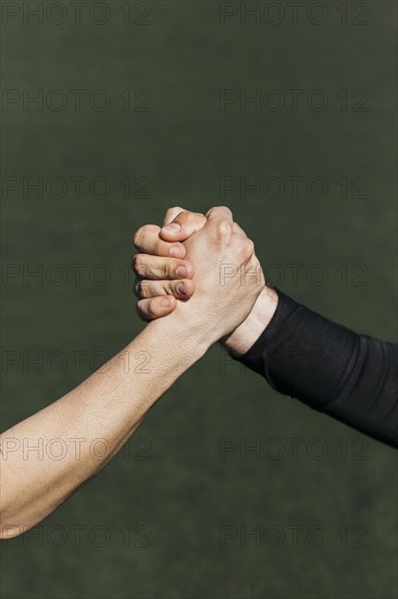 Handshake football field