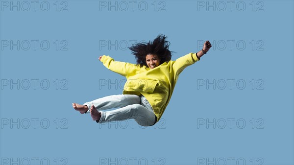Happy young woman jumping 5