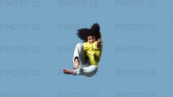 Happy young woman jumping 7