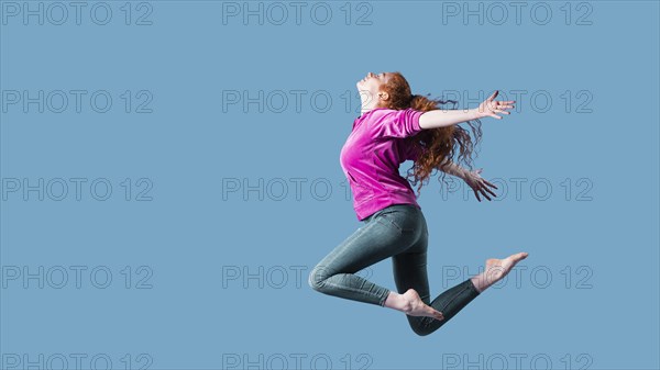 Happy young woman jumping 8