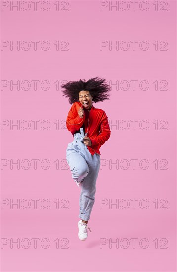 Happy young woman jumping 9