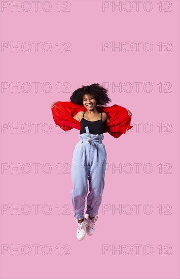 Happy young woman jumping 12