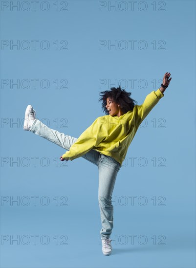 Happy young woman jumping 14