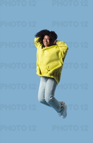 Happy young woman jumping 17