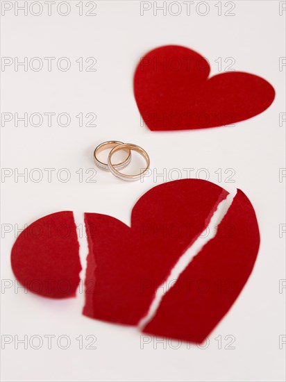 High angle marriage rings paper heart broken