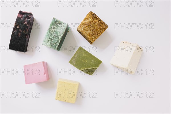 High angle view colorful soap bars white surface