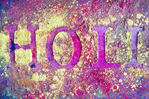 Holi inscription purple table