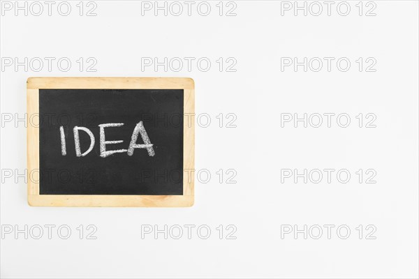 Idea text written slate white background