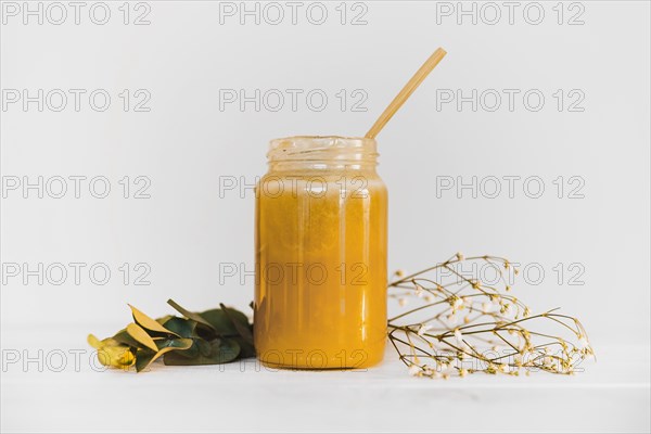 Jar lemon curd white background